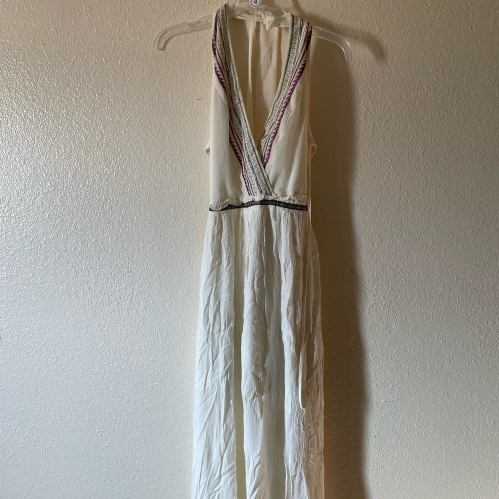 Long backless cream/white colored dress with deep plunge